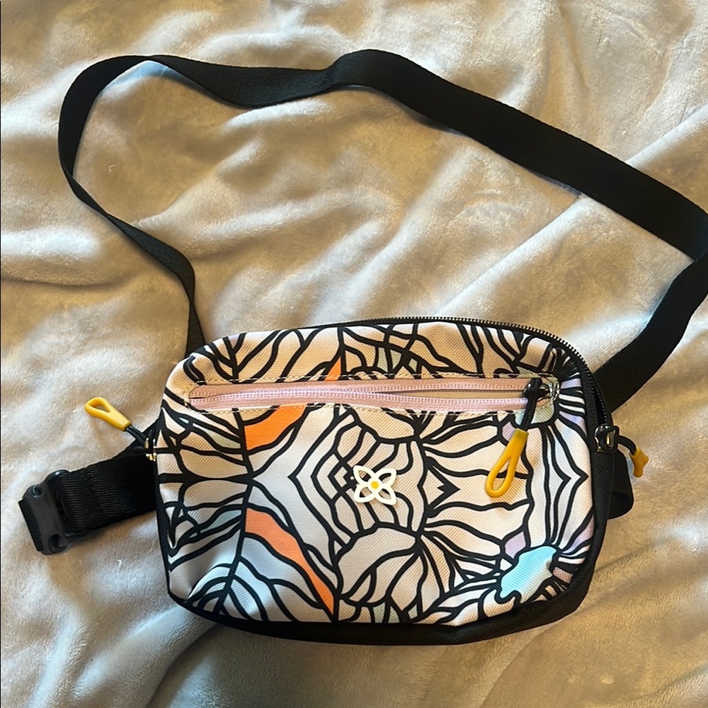 Sherpani Black and White Crossbody Bag with Orange and Blue Accents